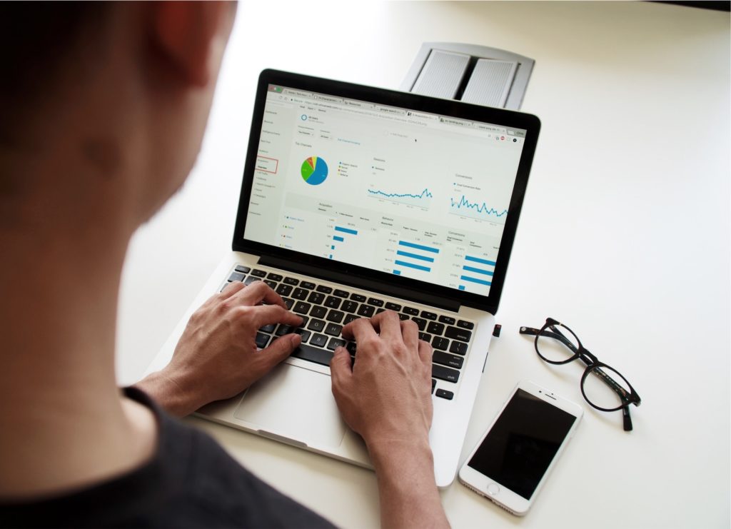man on macbook declared data article