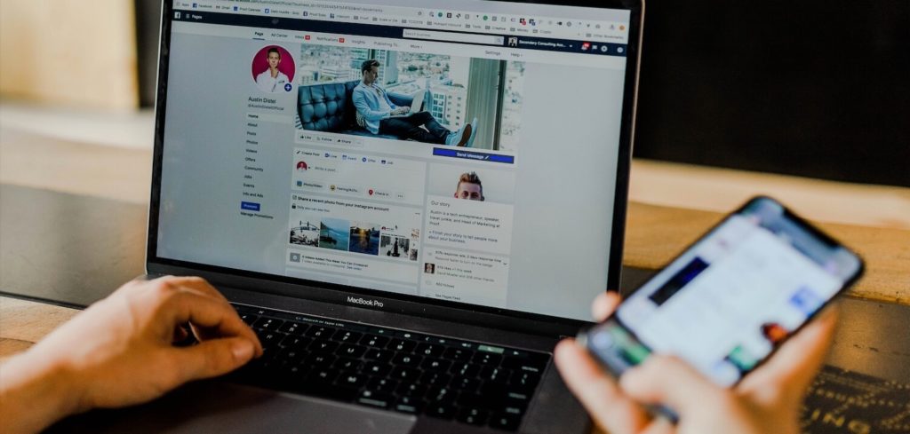 Customer engages with Facebook on laptop and cell phone