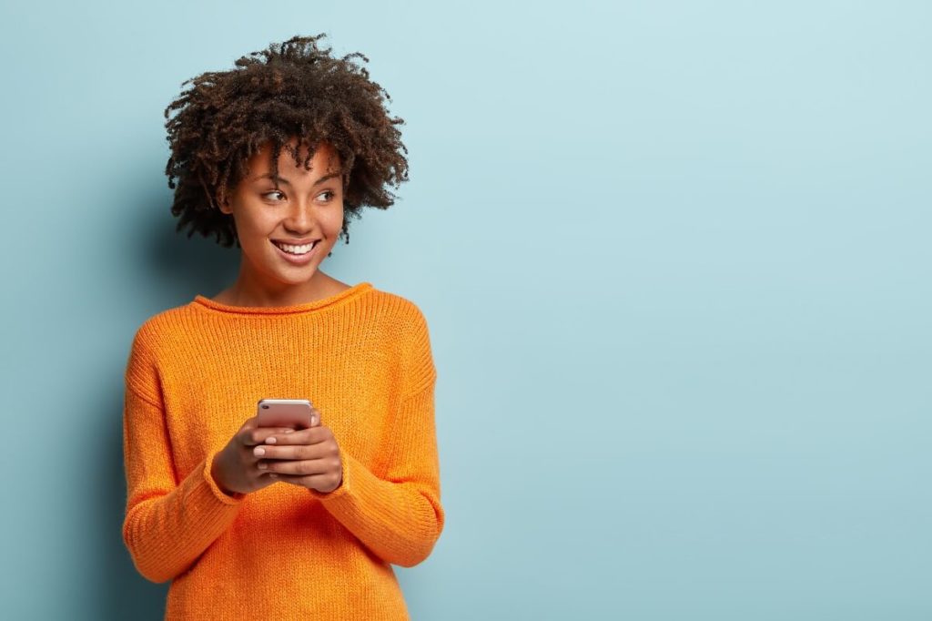 Happy women using smartphone